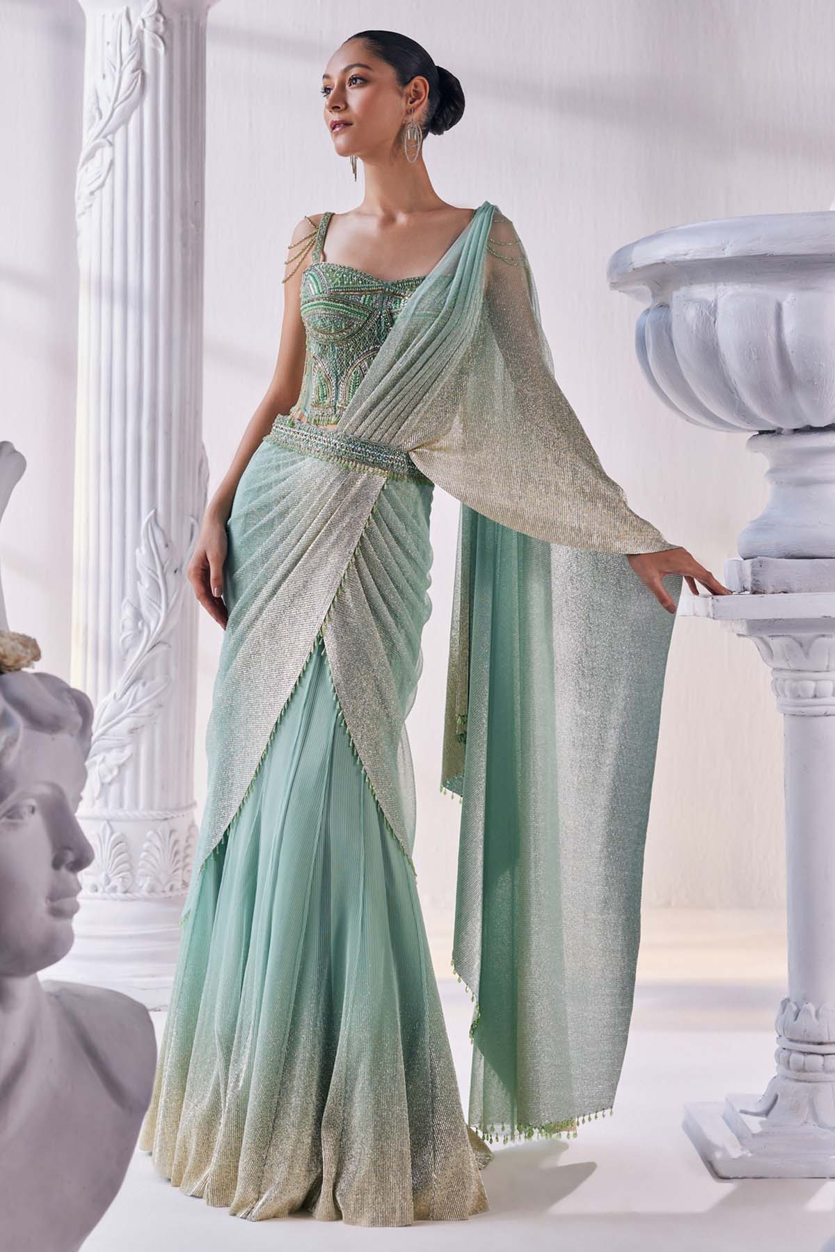 Buy Pleated Gold Foil Lehenga Set by Mandira Wirk